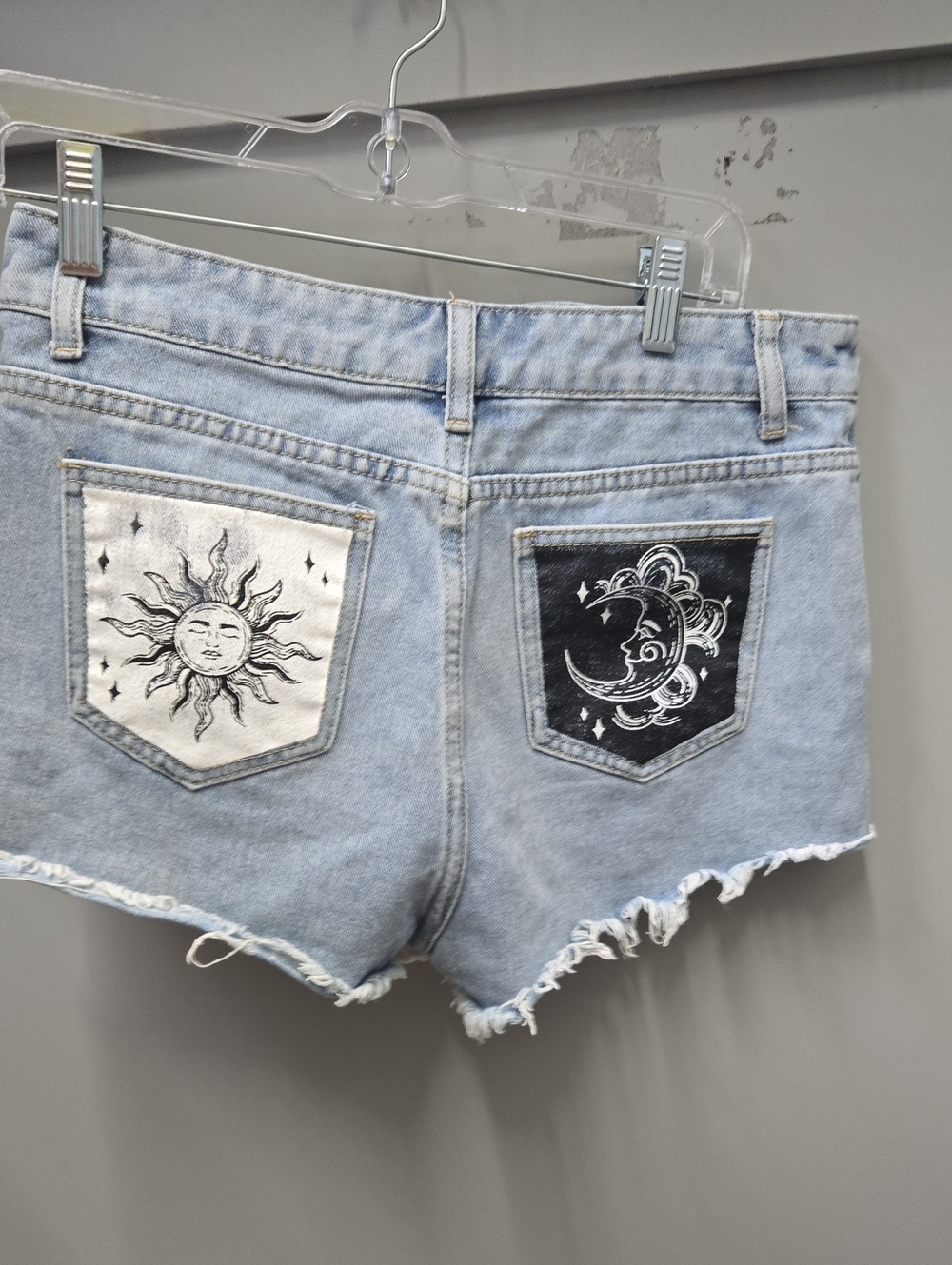 SHEIN Light Blue Denim Shorts with Sun & Moon Pocket Art